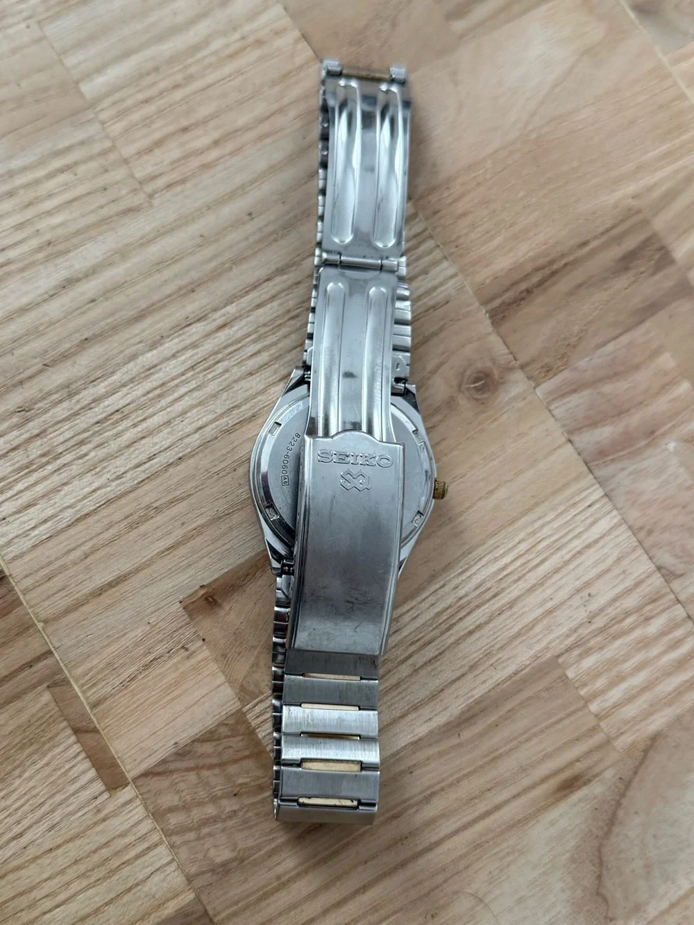 Seiko SQ Vintage Watch Gold Plated Bezel and Bracelet Black Dial Date Window
